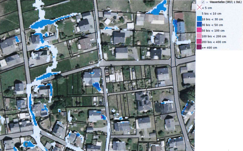 Eine Flurkarte mit dem Ausschnitt von Friedewald auf dem mit blau und lila die Sturzflutgefahr markiert ist.